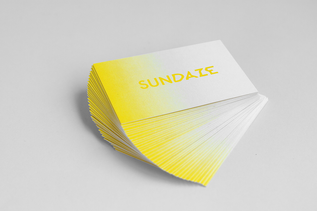 A stack of SUNDAZE identity cards