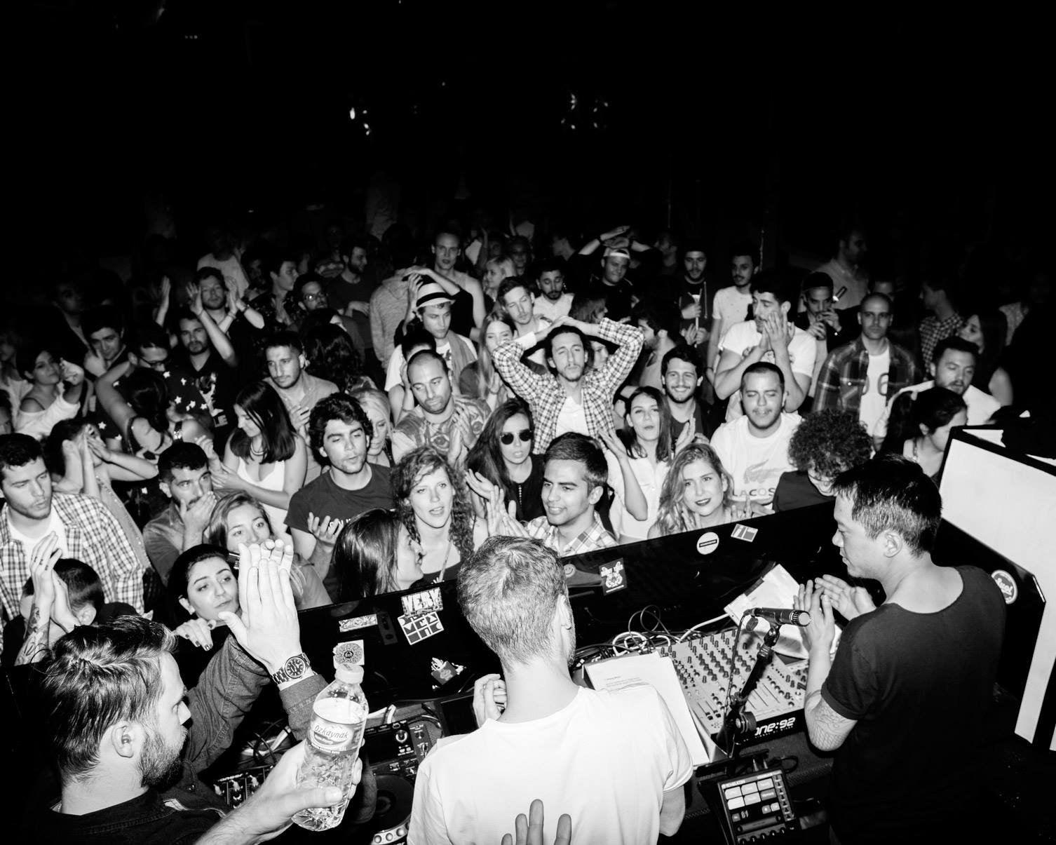Downtown Festival audience surrounding the DJ booth